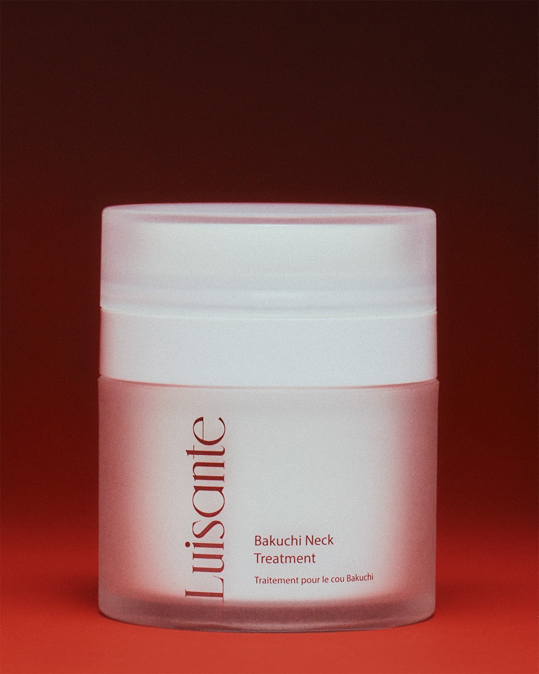 Luisante Bakuchi neck treatment in a frosted jar with white lid for neck skincare