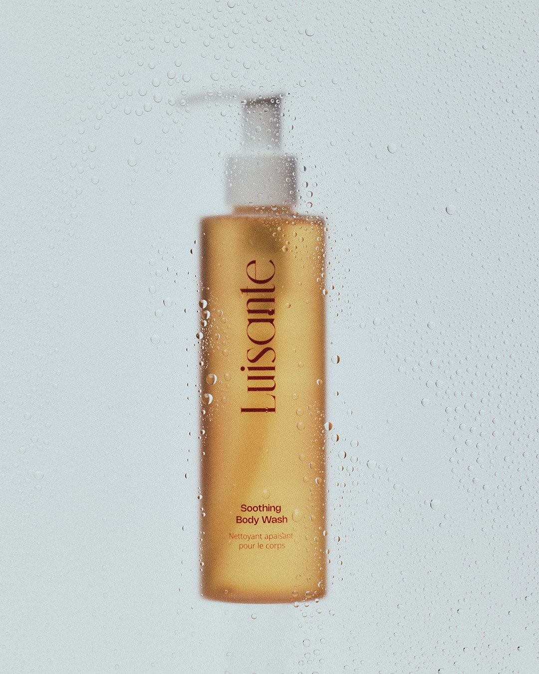 Luisante soothing body wash for all skin types in a golden pump bottle with soothing formula